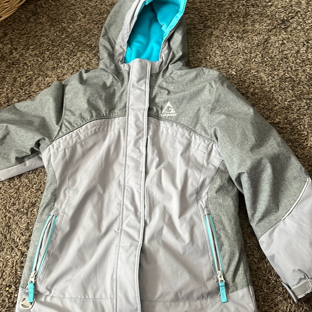 gerry brand, very soft fabric on inside.. grey and teal